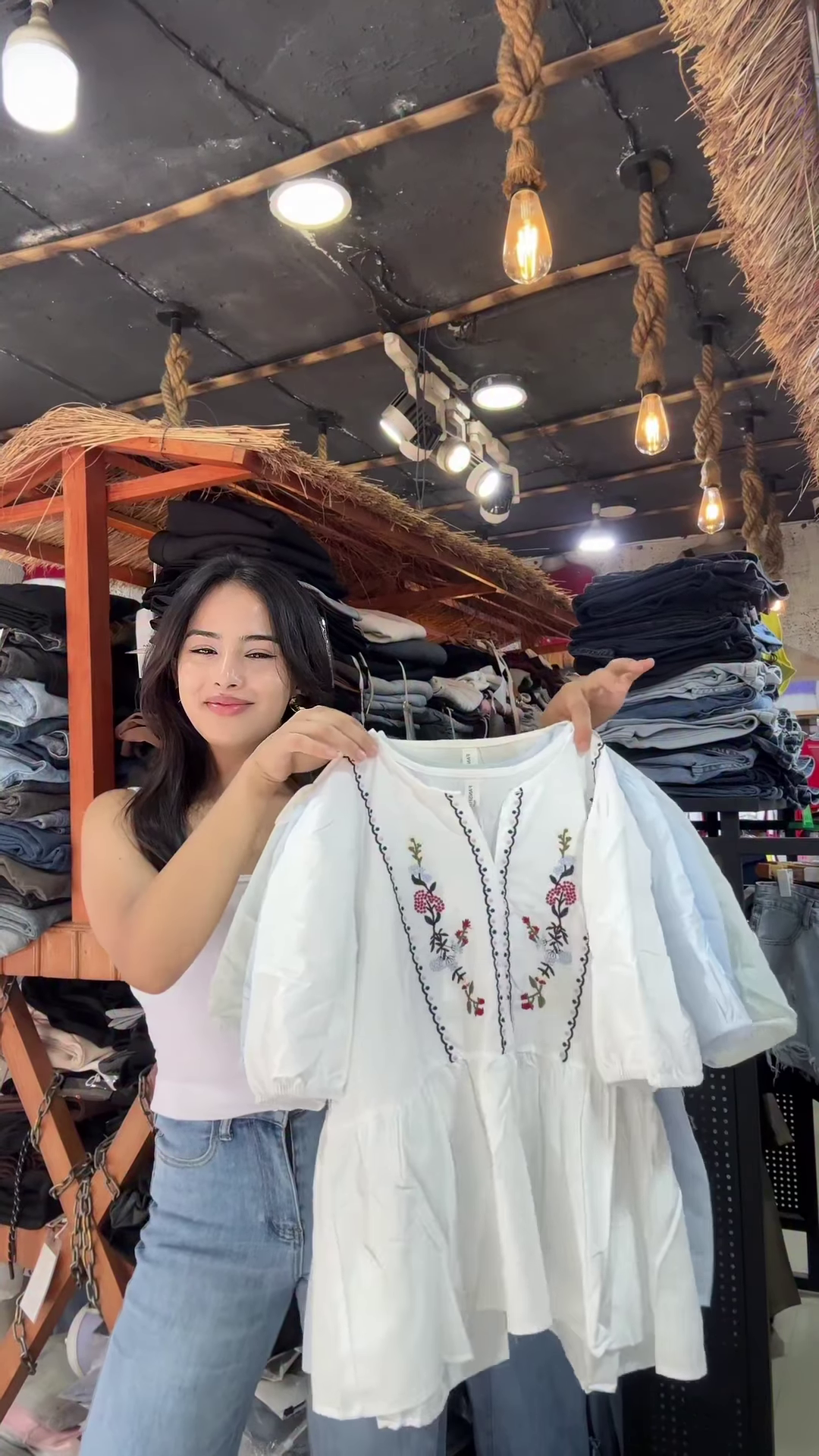 White Floral Embroidered Blouse with Light Blue Jeans – Casual Boutique Look for Women - Image 3