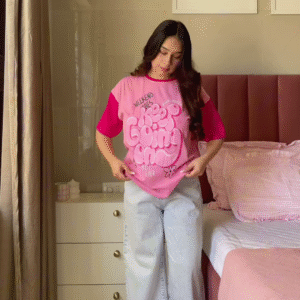 Pink Graphic T-Shirt with “Weekend Vibes” Print Paired with Light Blue Wide-Leg Jeans