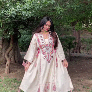 Cream-Colored Embroidered Traditional Dress with Colorful Circular Motifs and Pink Tassel Accents