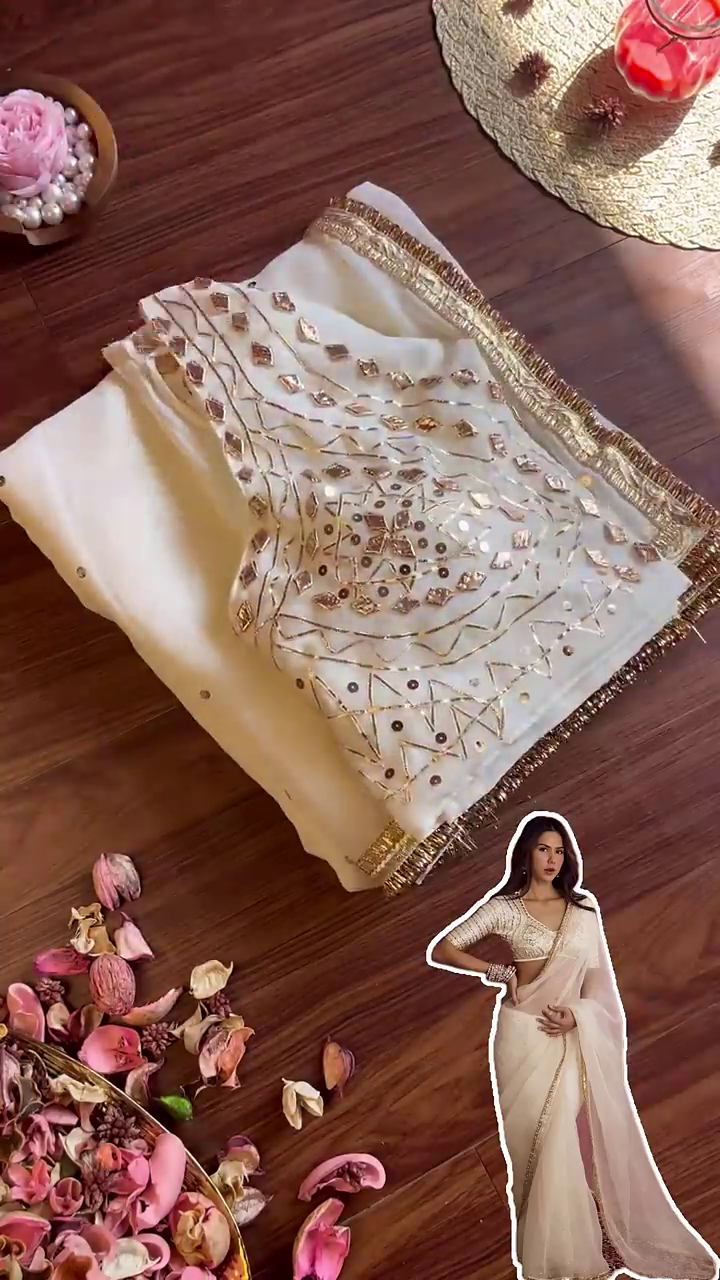 Luminous Cream Saree with Ornate Geometric Artistry